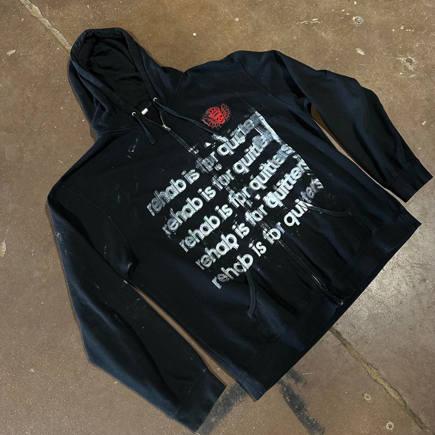 SKULL REHAB IS FOR QUITTERS ZIP UP
