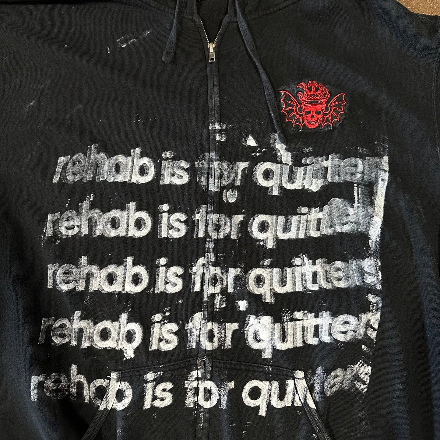 SKULL REHAB IS FOR QUITTERS ZIP UP