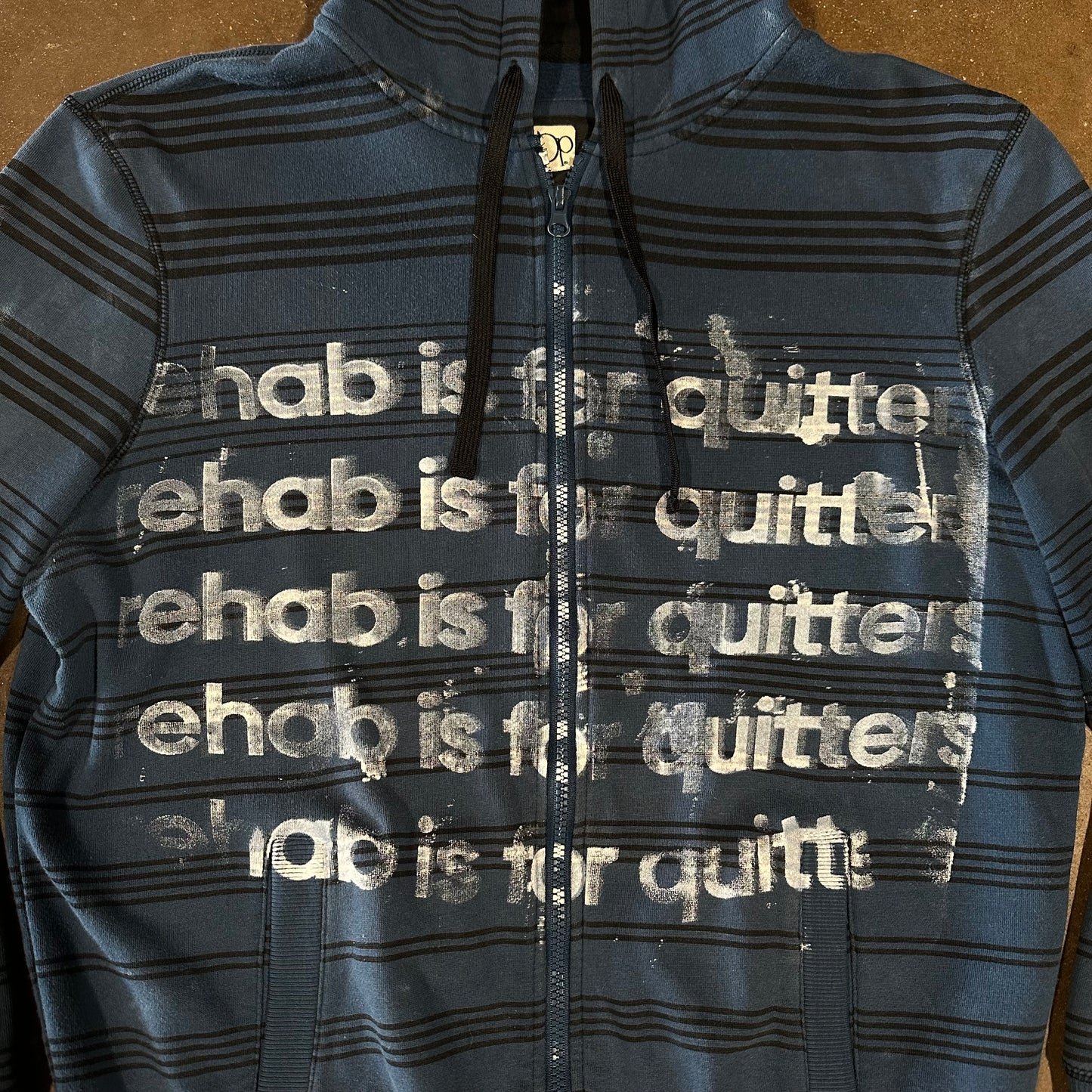 BLUE STRIPE REHAB IS FOR QUITTERS ZIP UP