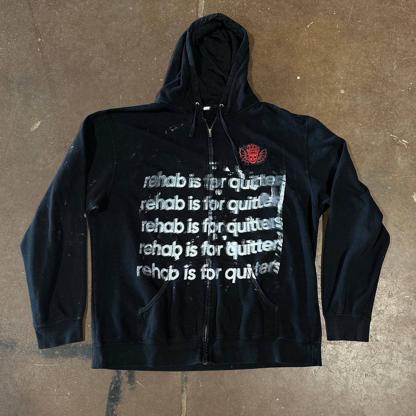 SKULL REHAB IS FOR QUITTERS ZIP UP