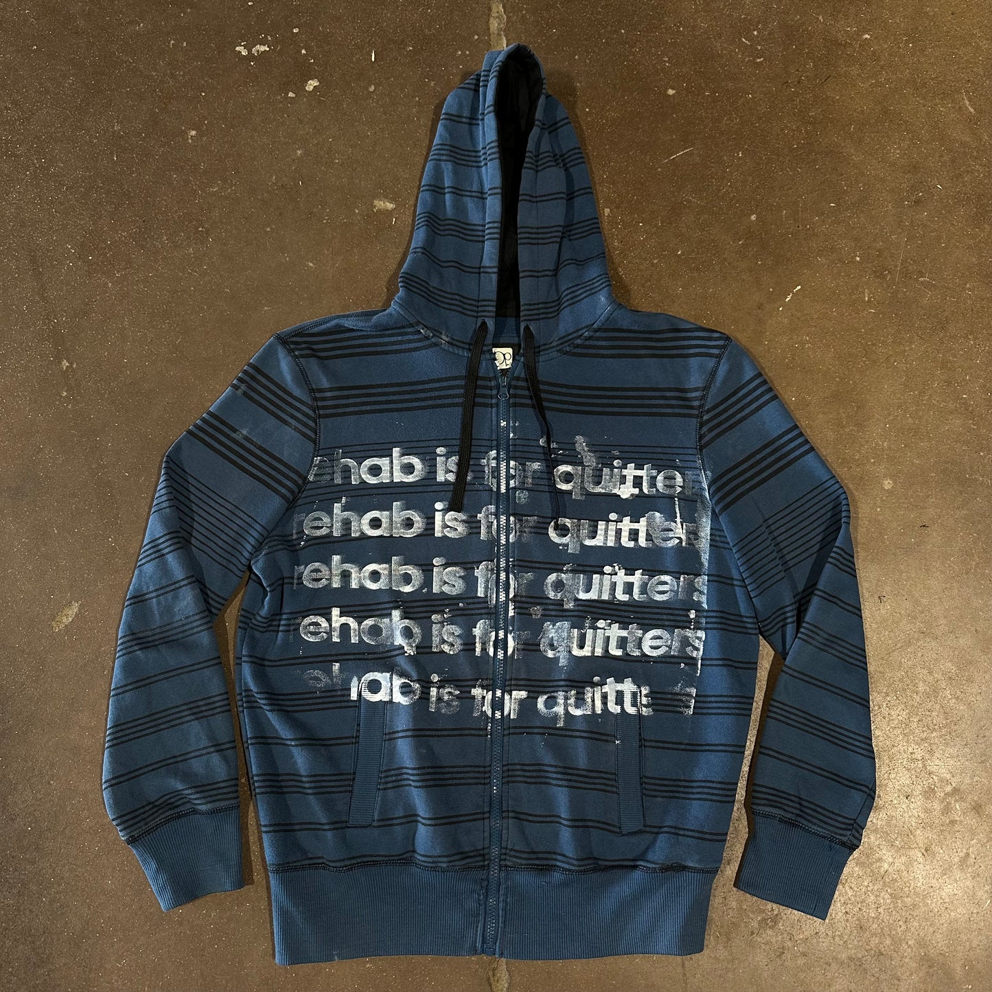 BLUE STRIPE REHAB IS FOR QUITTERS ZIP UP