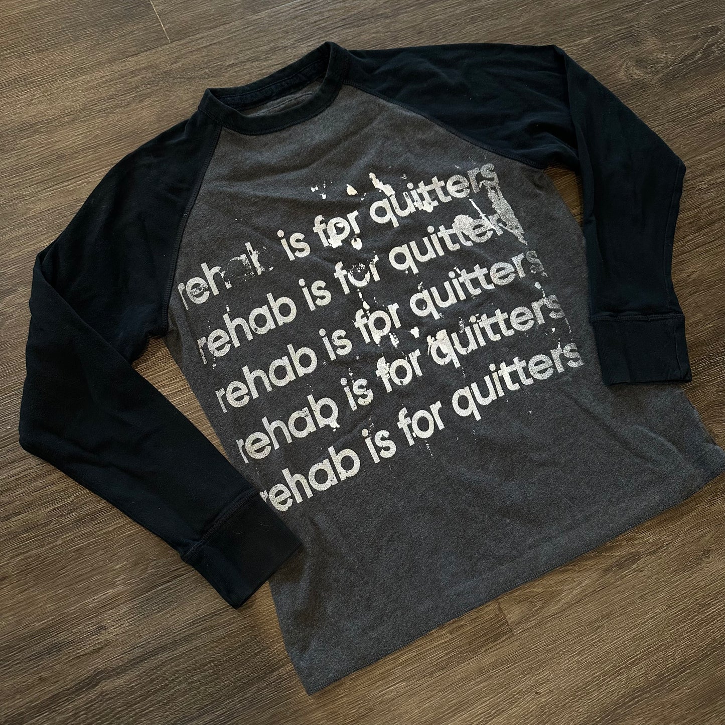 BLACK AND GREY LONG SLEEVE REHAB IS FOR QUITTERS SHIRT