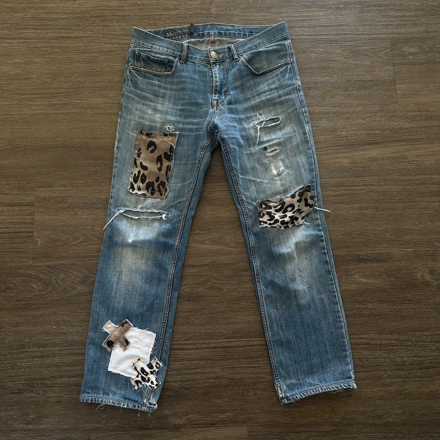ARMANI EXCHANGE LEOPARD PRINT REPAIRED “X” DENIM