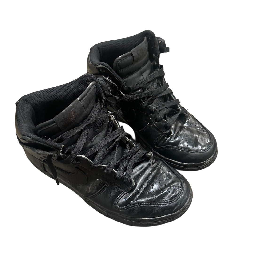 top angle of black painted nike dunk grunge shoes 